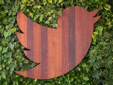 Twitter value down $8 bin on slowing growth